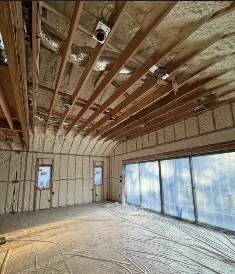 Interior walls and ceiling insulated with spray foam during new construction in Trinity